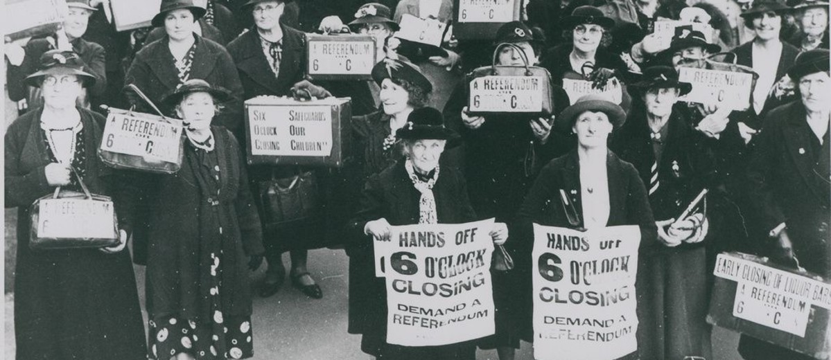 Image: group of women holding posters