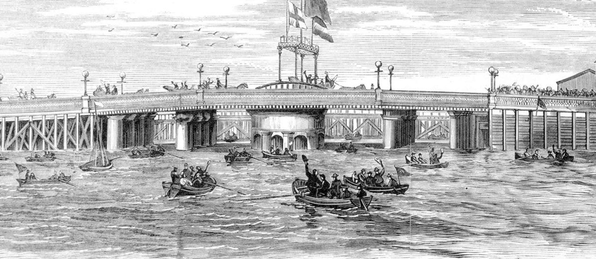 Image: Wood engraving depicting a multitude of people standing atop a bridge, while others celebrate in several small boats in the surrounding river. Three large flags, including an English St. George’s cross, are flying from the bridge’s central tower  