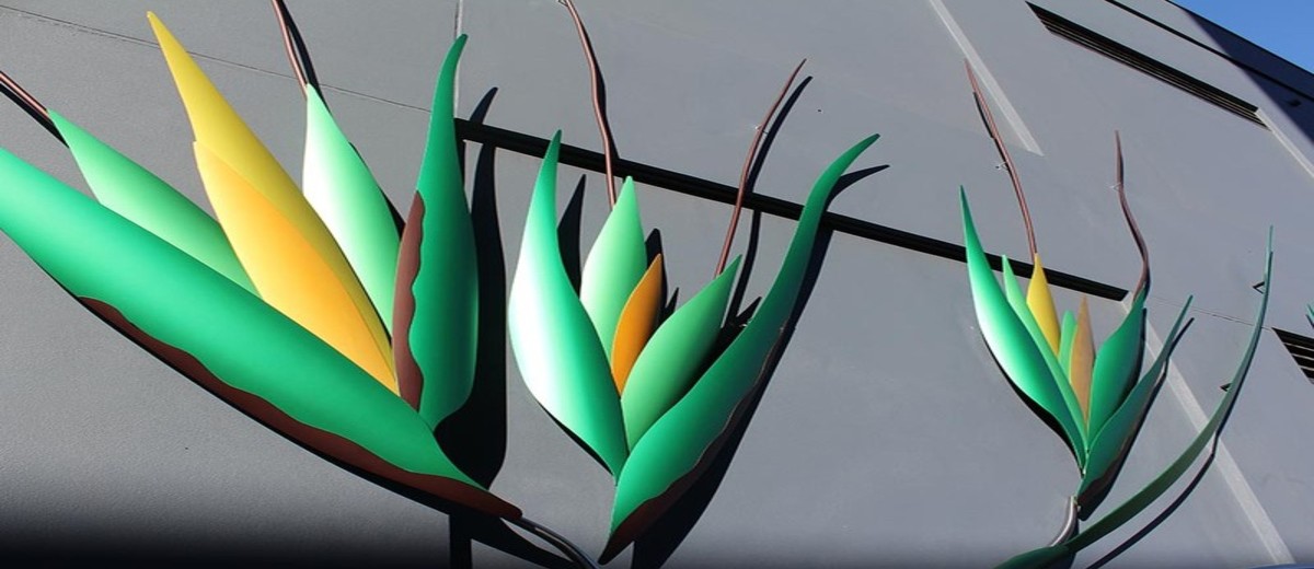 Image: 3D sculpture of Kangaroo grass against black gridded wall