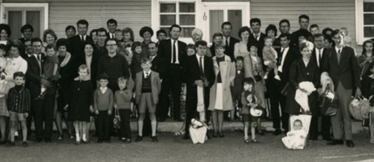 Image: large group of people in front of building