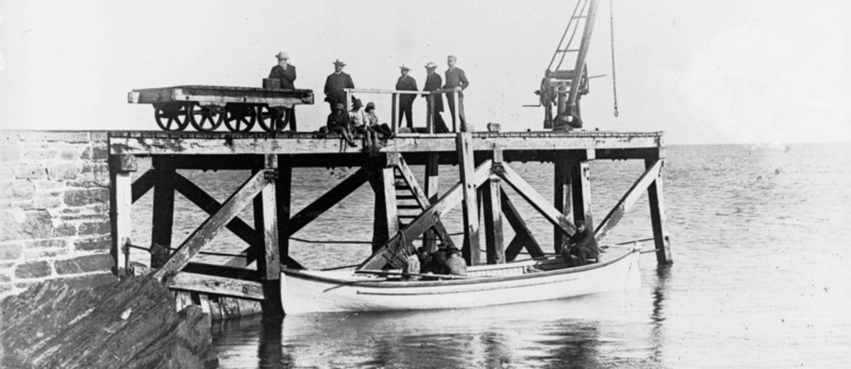 Image: men on a jetty