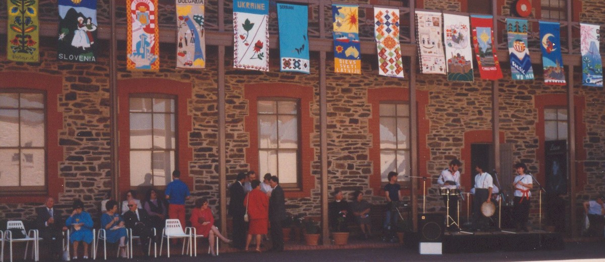 Image: building displaying banners from first floor balcony
