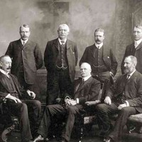 Image: Group portrait of men in suits