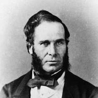 Image: Black and white portrait of a man with heavy sideburns