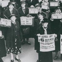 Image: group of women holding posters