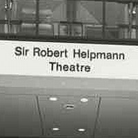 Image: The entrance to a large, modern three-storey building. A sign on the front of the building reads ‘Sir Robert Helpmann Theatre’ 