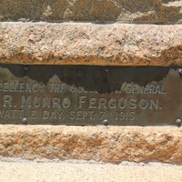Image: inscribed bronze plaque in stone