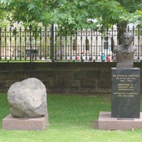 Bronze bust of Douglas Mawson by John Dowie, 1981 with boulder from Mawson, Antarctica