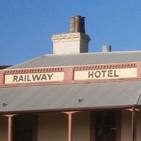 Image: A two-storey Victorian-era building with the words ‘Railway Hotel, 1856’ painted just below the roof