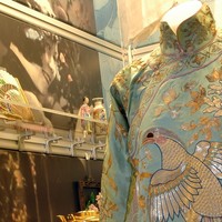 Image: display case showing Chinese costume