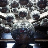 Image: a group of large mirror balls