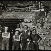 Image: Men working in mine pose for photograph