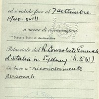 Image: open passport showing handwritten details