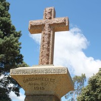 Image: stone cross in park land
