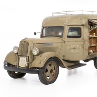 Image: khaki coloured van packed with goods