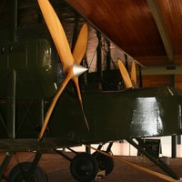 Biplane displayed in a building