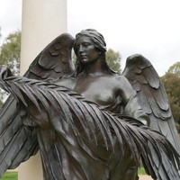Image: Bronze statue of female angel with leaves