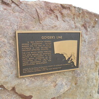 Image: bronze plaque on large stone