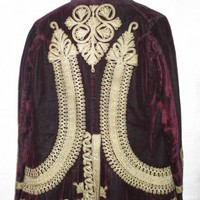 Image: Burgundy velvet male jacket.