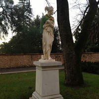 Image: statue with crocehted cape around shoulders