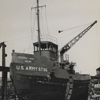 Image: Front view of a tug boat sitting in a yard in the process of being constructed
