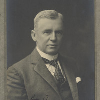 Image: portrait of man wearing tie and suit jacket