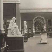 Image: The interior of an art gallery featuring a number of marble statues