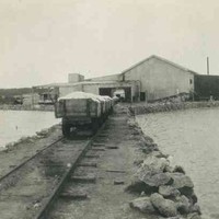 Image: carts on a rail in front of shed