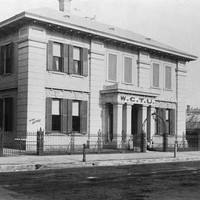 Image: photo of headquarters of the Woman's Christian Temperance Union. Letters W.C.T.U are written above the entrance 