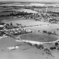 Image: flooded landscape with oval outlined by floodwaters