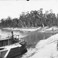 Image: Boat on land next to river Murray