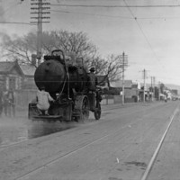 Image: Black and white photo of a Mann tar-sprayer on Unley Road, twentieth century.