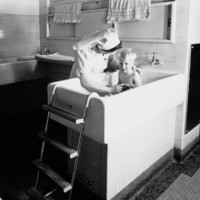 Image: Nurse bathing boy
