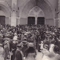 Image: People gathered within a chapel as a funeral takes place
