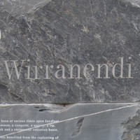 Image: A sculpture comprised of four large stones stacked atop one another. The word ‘Wirranendi’ is inscribed in the top stone, along with additional informative text