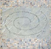 Image: words engraved in spiral shape in stone