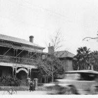 Image: Black and white photograph showing the exterior of the original Liberal Union Club located in a double story Victorian style house on North Terrace
