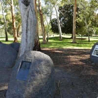 Image:  boulders with sculpture and plaques mounted on them