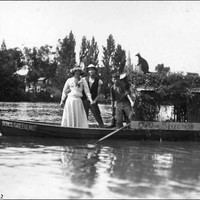 Image: People posing in a row boat