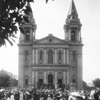 Image: a crowd of people standing outside a church
