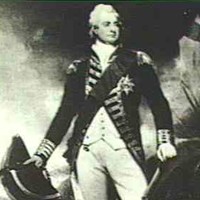 Image: photograph of a man standing amongst rocks and trees wearing a white wig, and a dark military style coat and sash over a cream waistcoat and breeches. He is holding a large hat and sword in one hand and a gun in the other/