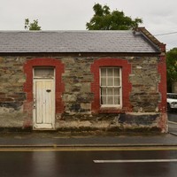 Image: single story stone building