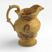 Image: brown jug with images of flowers and a woman
