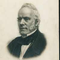 Image: head and shoulders portrait of a man with sideburns 