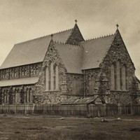 Image: Gothic Revival church near a tree