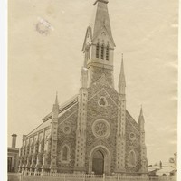 Image: view of church facade and bell tower from Flinders street