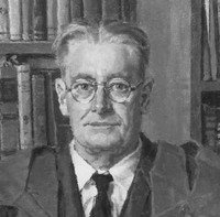 Image: A painted portrait of a middle-aged man sitting in a chair in front of a large bookcase. He is wearing wire-rimmed spectacles, a suit and tie, and academic gown 