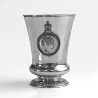 Image: silver cup with image of a woman on side