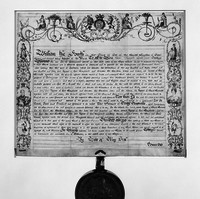 Image: Old document in browning ink with large wax seal attached at bottom