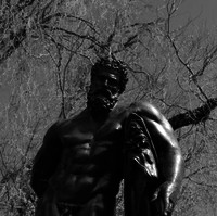 Image: Bronze statue of a mans upper body
